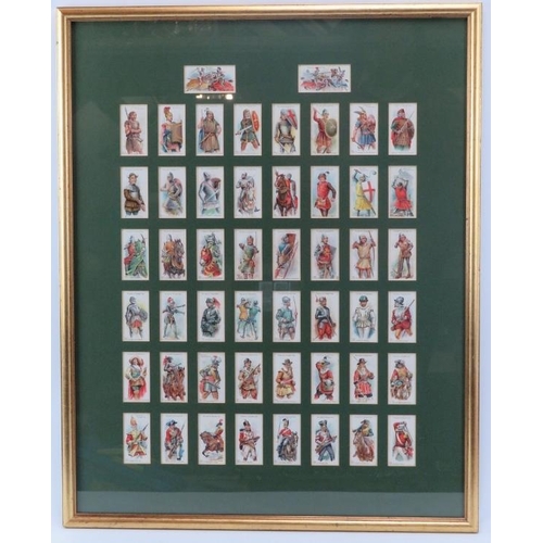 83 - A framed set of John Player & Sons ‘Arms & Armour’ cigarette cards. Mounted, framed and glazed to th... 