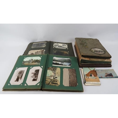 91 - A collection of postcards and scrap book cuttings, early 20th century. Four albums containing postca... 