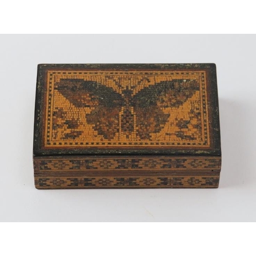 97 - A Tunbridge Ware miniature box decorated with a butterfly mosaic to the cover. 7.1 cm length.
Condit... 