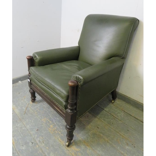 701 - A good 19th century oak library chair, reupholstered in juniper green leather with brass studs, the ... 