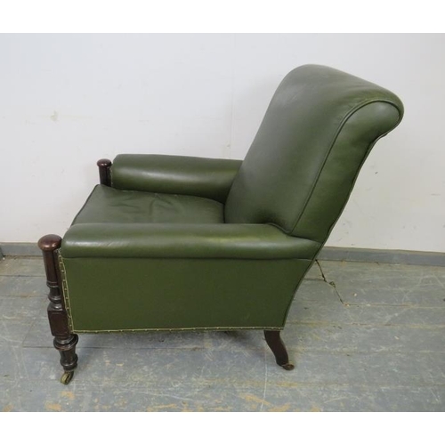 701 - A good 19th century oak library chair, reupholstered in juniper green leather with brass studs, the ... 