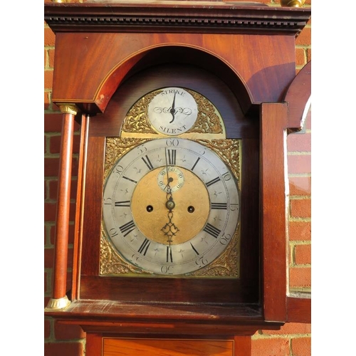 703 - A George III flame mahogany cased 8-day striking longcase clock, marked J. Cowen of London, the cadd... 