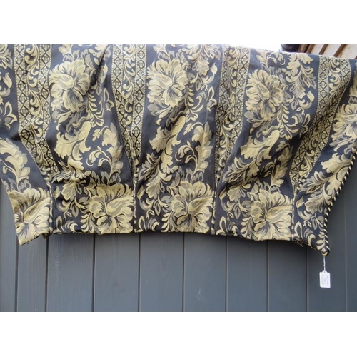 707 - A pair of good quality full length lined drapes, in tapestry material with acanthus pattern and blac... 