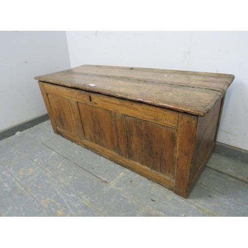 713 - An early 18th century pine panelled coffer, with internal candle box. 
H47cm W118cm D48cm approx.
Co... 