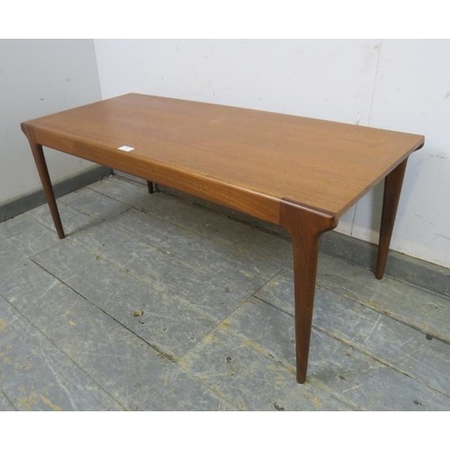 722 - A mid-century teak rectangular coffee table by McIntosh, on tapered supports. 
H42cm W105cm D45cm ap... 