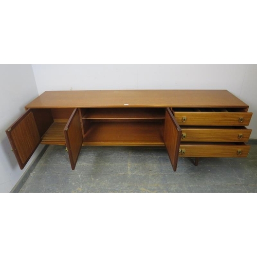 731 - A mid-century teak sideboard by Younger, housing three cupboards with loose shelf, and three short d... 