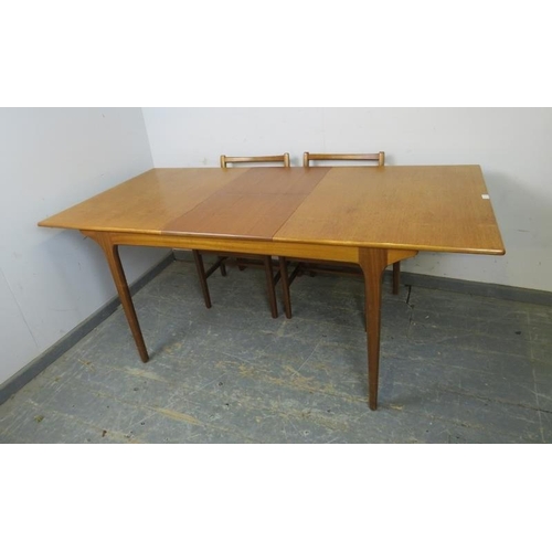 732 - A mid-century teak extending dining table by Younger to match previous lot, with butterfly folding c... 