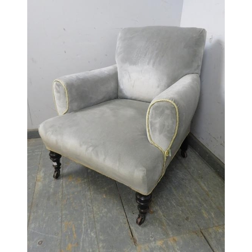 741 - A small 19th century club armchair, reupholstered in grey velvet with gold braid trim, on ebonised t... 