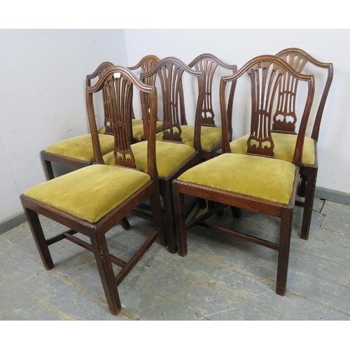 742 - A matched set of six George III mahogany dining chairs in the manner of Hepplewhite, plus one simila... 