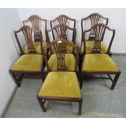 742 - A matched set of six George III mahogany dining chairs in the manner of Hepplewhite, plus one simila... 