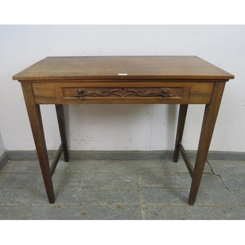 743 - A bespoke antique style hardwood hall table, housing one long drawer with relief decoration depictin... 