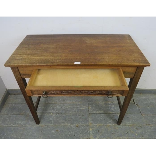 743 - A bespoke antique style hardwood hall table, housing one long drawer with relief decoration depictin... 