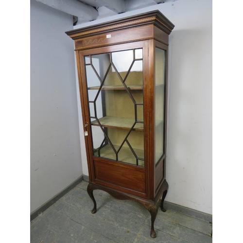 746 - An Edwardian mahogany glazed display cabinet, the stepped cornice with marquetry inlaid frieze, abov... 