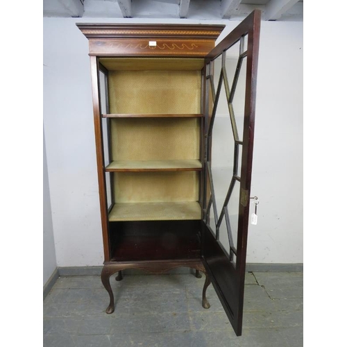 746 - An Edwardian mahogany glazed display cabinet, the stepped cornice with marquetry inlaid frieze, abov... 