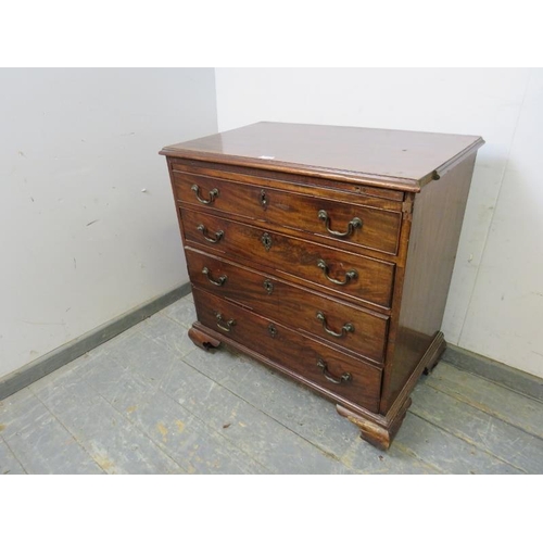 753 - A Georgian mahogany batchelor's chest of small proportions, having a pull-out brushing slide above f... 