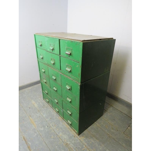 766 - A vintage industrial steel bank of 18 drawers, having scalloped handles and name plate holders, pain... 