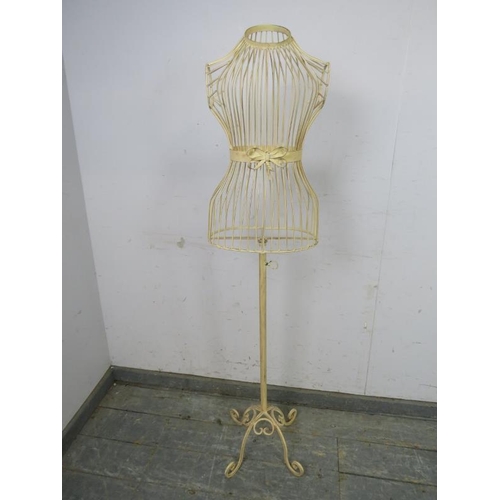 787 - An antique French style wirework shop mannequin, painted cream and distressed, on a scrolled wrought... 