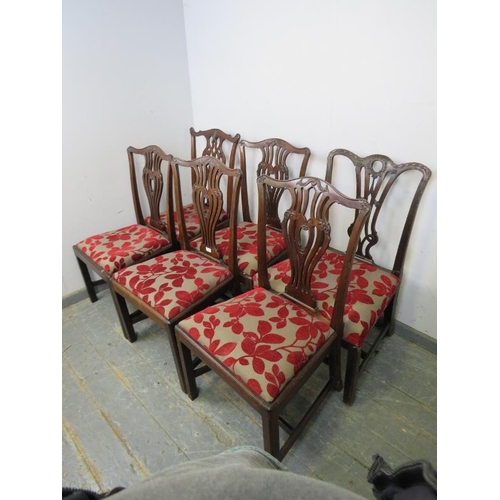 790 - A matched set of six Georgian mahogany dining chairs in the Chippendale taste, the well carved and p... 