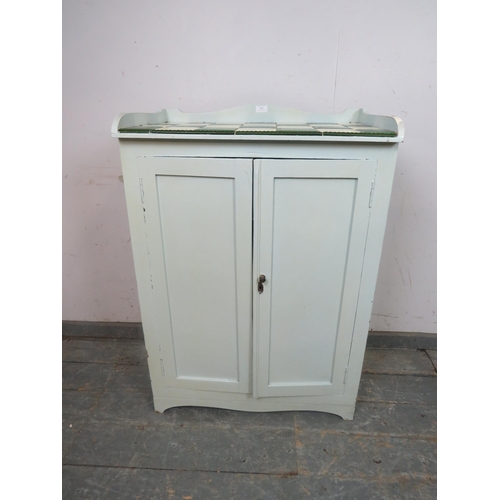 795 - An antique pine cabinet painted grey, the top with ¾ gallery and inset green and cream tiles, above ... 