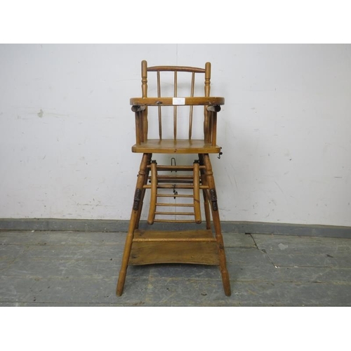 797 - A 19th century beech and walnut metamorphic child’s highchair, on canted supports with stretchers. 
... 