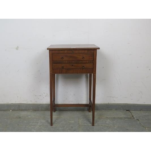 802 - A Regency worktable strung with ebony, the hinged lid opening onto a storage well with dummy drawer ... 