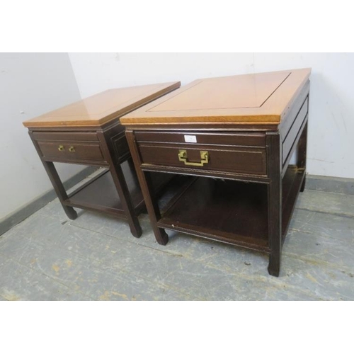 806 - A pair of vintage Chinese hardwood two-tier side tables, each housing one long drawer, on square sup... 