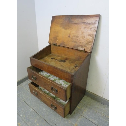 809 - A diminutive bespoke made antique oak chest, the rising lid with relief carved heraldic crest, above... 