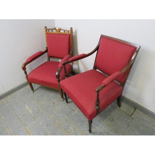 810 - An Edwardian rosewood open-sided armchair, marquetry inlaid and strung with satinwood, reupholstered... 