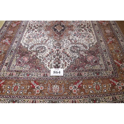 864 - North West Persian Tabriz rug.  A lovely quality rug, central motif on cream ground with Quater Spon... 