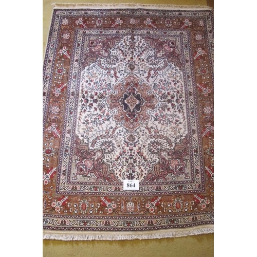 864 - North West Persian Tabriz rug.  A lovely quality rug, central motif on cream ground with Quater Spon... 