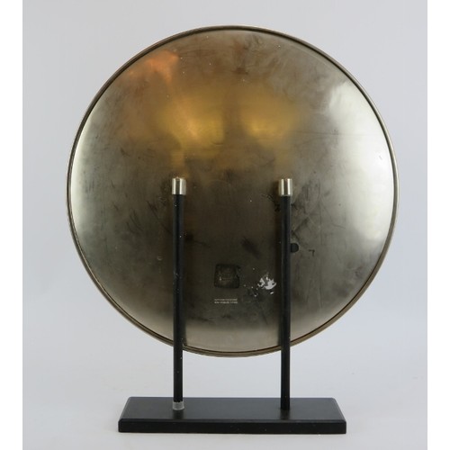 195 - A large African white metal ornamental plate on a stand, late 20th century. 47 cm diameter. 
Conditi... 