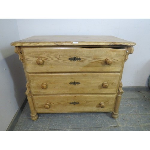 788 - A Continental antique pine chest, housing three long drawers flanked by carved pilasters, on tapered... 