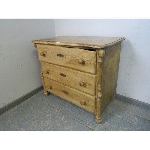 788 - A Continental antique pine chest, housing three long drawers flanked by carved pilasters, on tapered... 