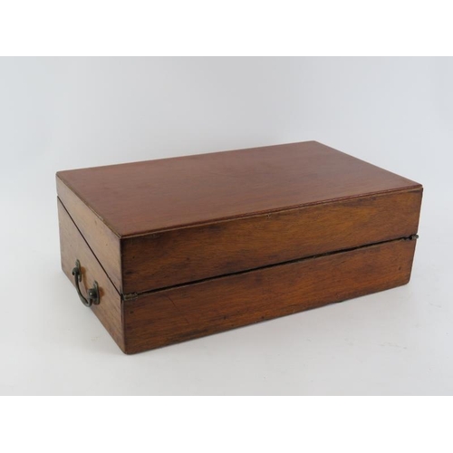 126 - A Victorian mahogany writing slope. With compartmented interior and external side draw. 42 cm length... 