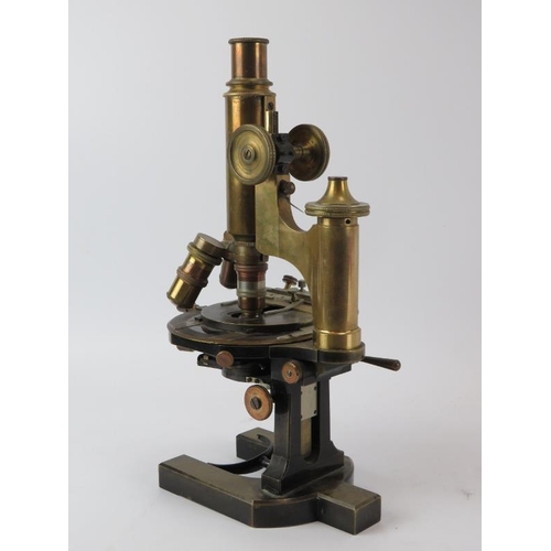 127 - A Carl Zeiss Jena microscope, late 19th/early 20th century. Numbered 33473 with mechanical stage. 32... 