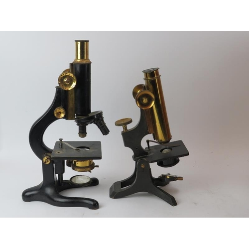 128 - A W Watson & Sons ‘Kima’ microscope and another Watson & Sons of London microscope. Both with cases.... 