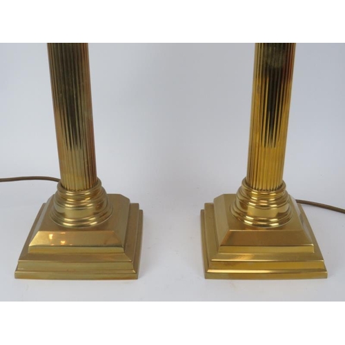 141 - A pair of modern corinthian column brass table lamps, late 20th century. (2 items) 73 cm total heigh... 