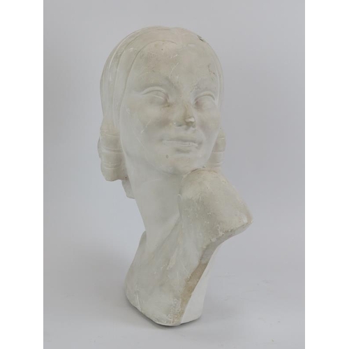 19 - An Art Deco carved plaster bust of a young woman, signed Guero. 37 cm height.
Condition report: Some... 