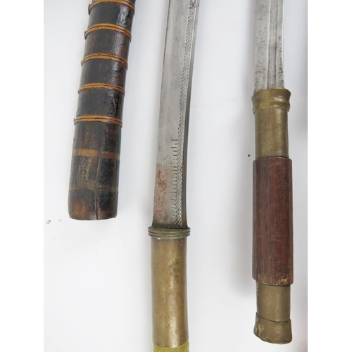 209 - A vintage Burmese sword (Dha) and dagger, early/mid 20th century. (2 items) 89.5 cm length, 54.7 cm ... 