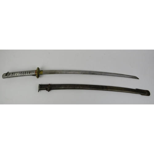 210 - A Japanese World War II NCO’s katana sword. With a cast metal grip, pierced brass tsuba and latch me... 