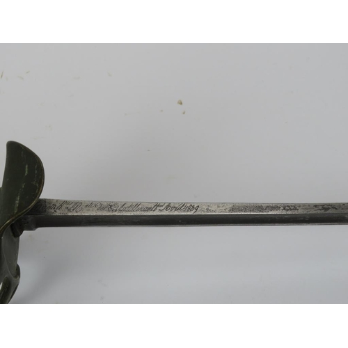 211 - A French Model 1822 Heavy Cavalry of the Line trooper’s sword, dated 1839. With iron scabbard, the s... 