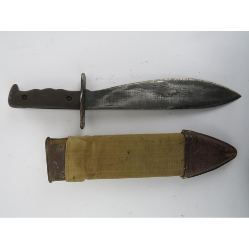 215 - An American WWI US Army 1917 pattern Bolo trench fighting knife. With original canvas and leather sc... 