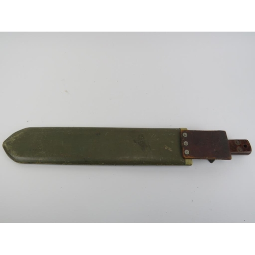 217 - A British Army issue WWII machete. Scabbard marked ‘P.I. 1944 33 with broad arrow and blade inscribe... 