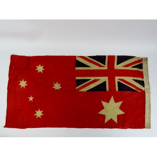 221 - An Australian merchant navy red fabric ensign flag, circa 1920s - 40s. 44 cm x 88 cm
Condition repor... 