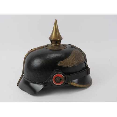 226 - An antique Prussian Officers Imperial Pickelhaube spiked helmet. 26 cm approximate length.
Condition... 