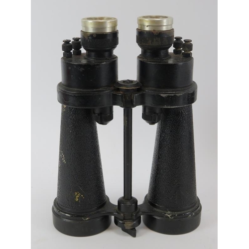 233 - Three pairs of WWII era binoculars. Barr & Stroud military issue binoculars, a French pair marked ‘P... 