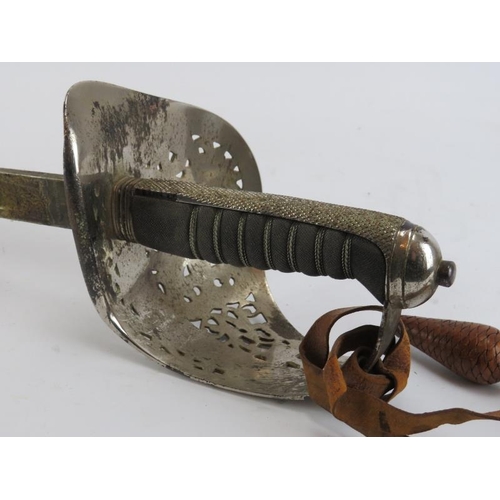 247 - Militaria: A Victorian Officers sword. With a wire bound fish skin grip. The blade marked ‘Pulford &... 