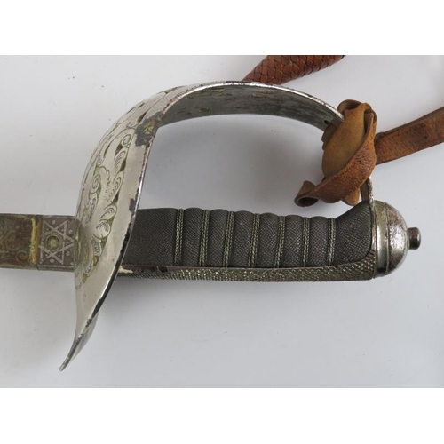 247 - Militaria: A Victorian Officers sword. With a wire bound fish skin grip. The blade marked ‘Pulford &... 