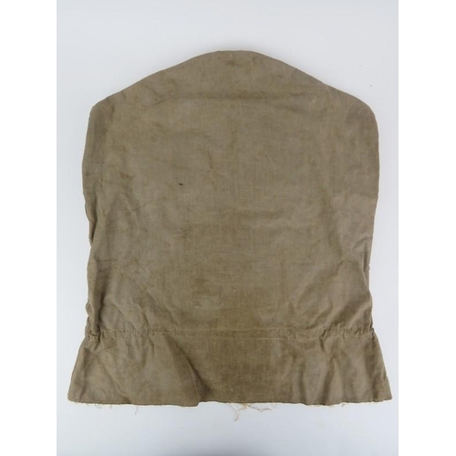 257 - A rare German WWI military anti gas helmet / hood. Internally inscribed ‘GEBR. HUENIG REGENMANTEL FA... 