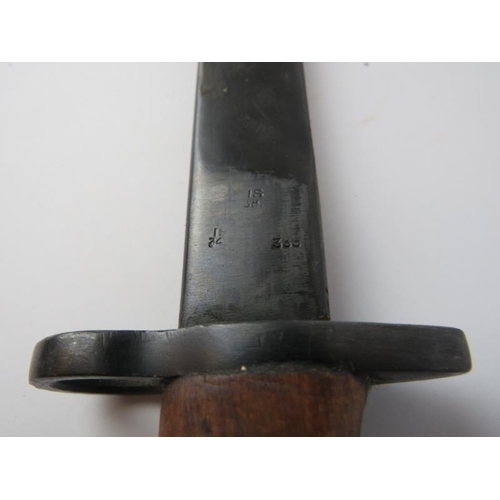 266 - A WWII British Indian army bayonet with scabbard. Ricasso struck with crown above ‘G.R.I. MkII* R.F.... 